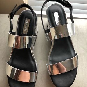 Platinum chrome platform shoes
